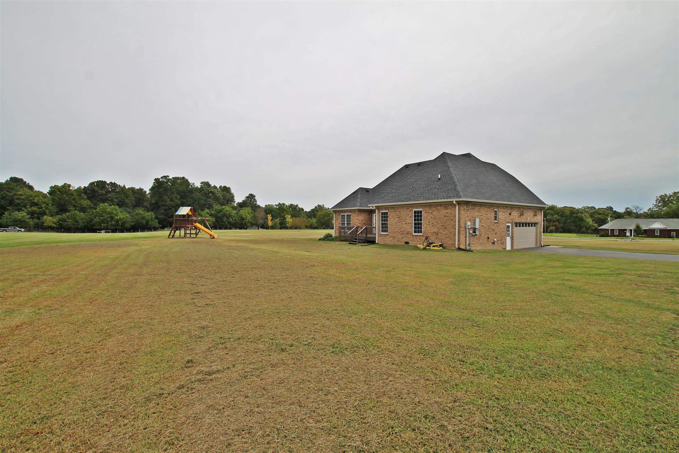 1012 Loganview Way Springfield, TN 37172 - Photo 28 of 30 a house with a lake view
