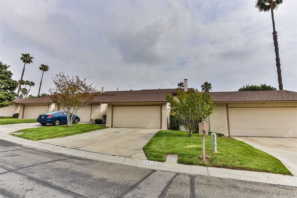 2618 Mangrove Way Riverside, CA 92506 - Photo 1 of 1 a front view of a house with garden