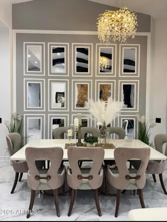 a kitchen with a sink cabinets and stainless steel appliances
