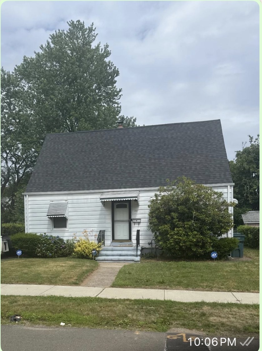 front view of house with a yard