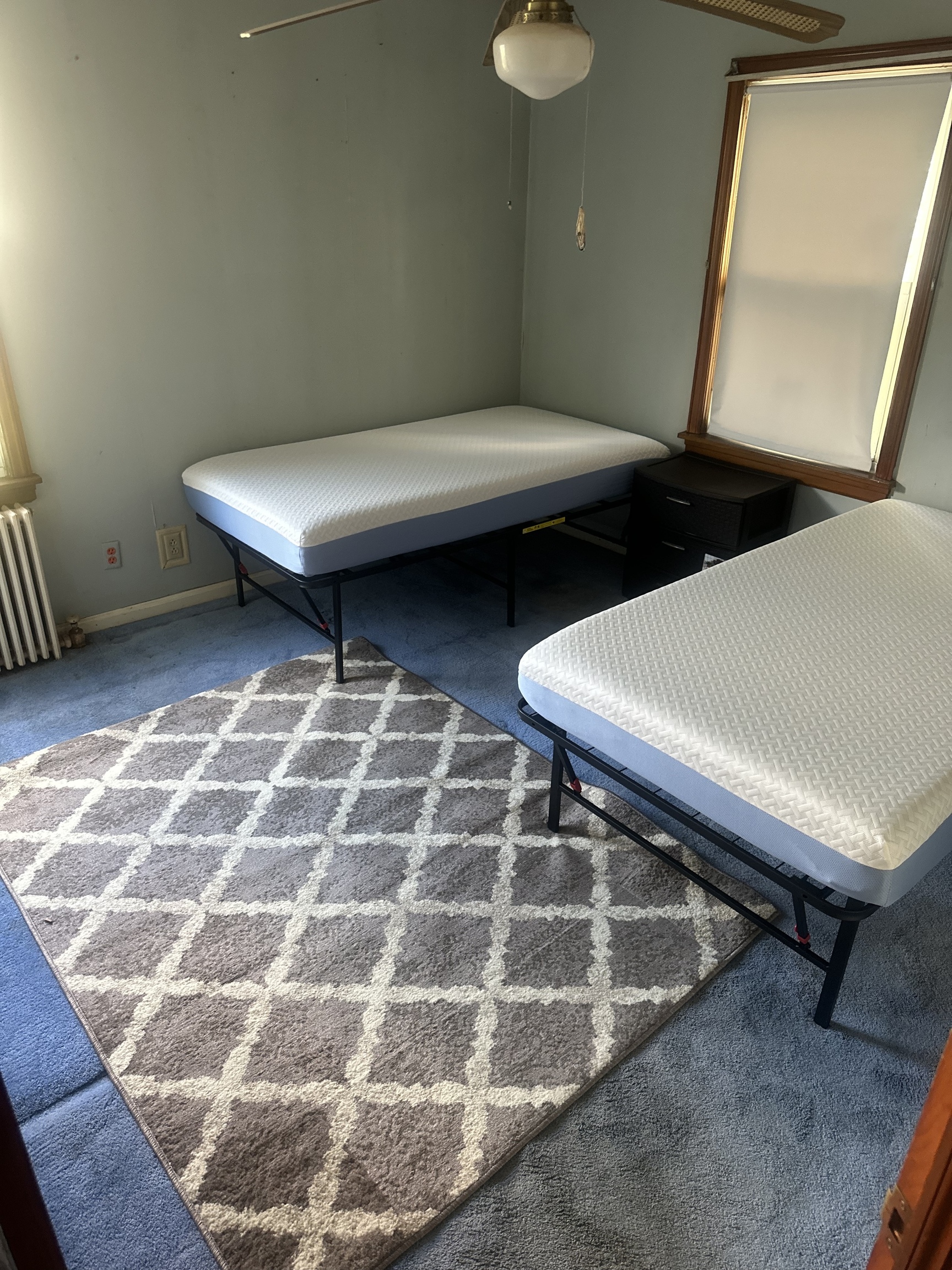 151 Warner Street Hamden, CT 06514 - Photo 6 of 7 a living room with a balcony furniture and a rug