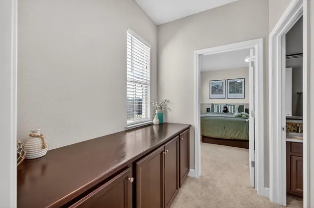 a view of a backyard with sitting area