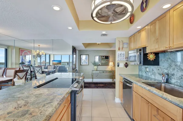 a view of a park with palm trees