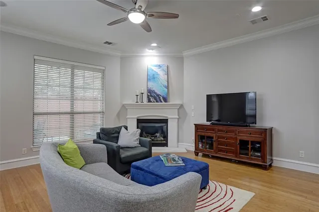 a spacious bedroom with a bed and a large window