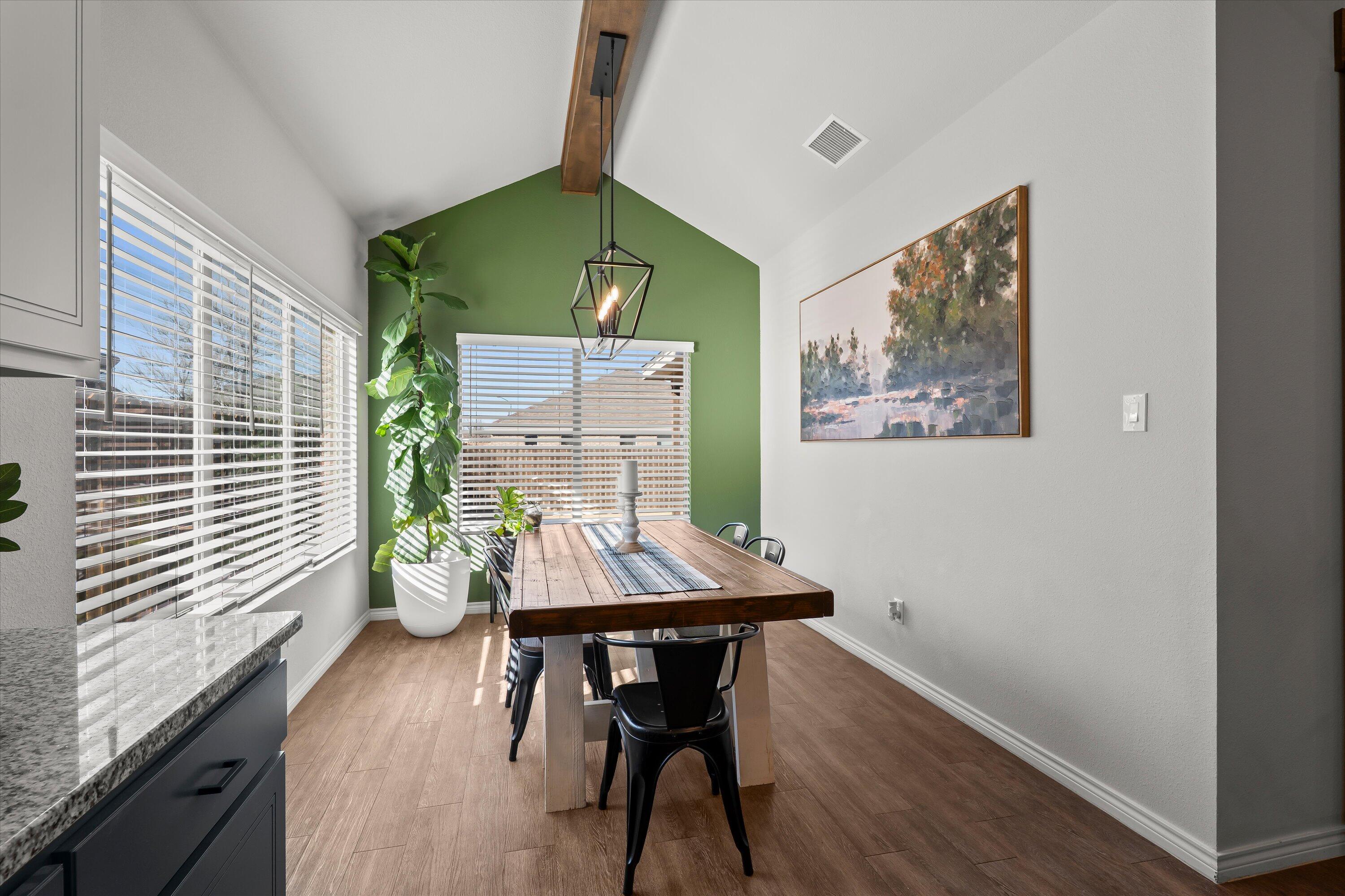 3438 125th Street Lubbock, TX 79423 - Photo 13 of 34 a view of a workspace with furniture and a window