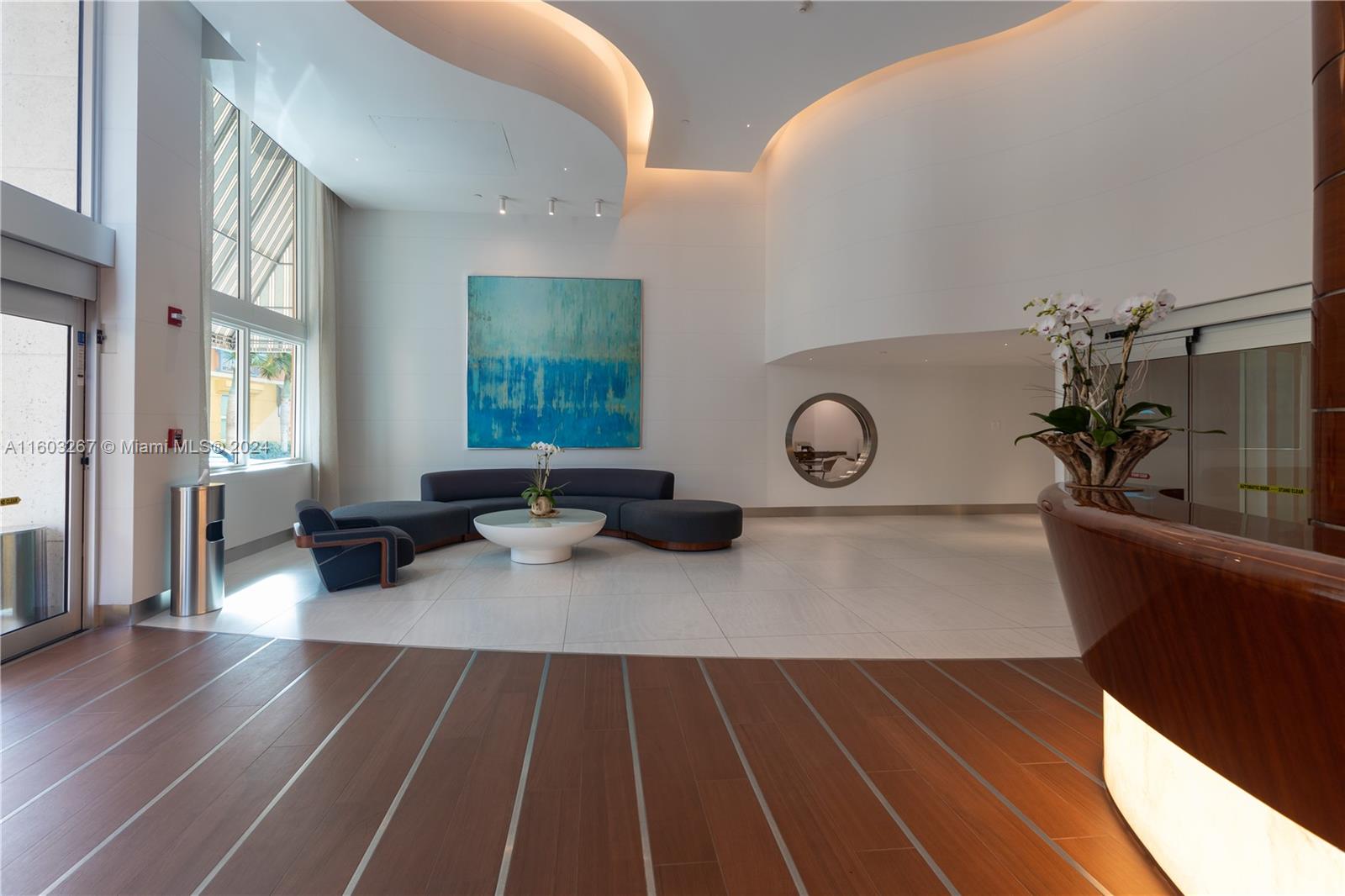 90 Alton Road, Unit 2806 Miami Beach, FL 33139 - Photo 19 of 36 a living room with furniture