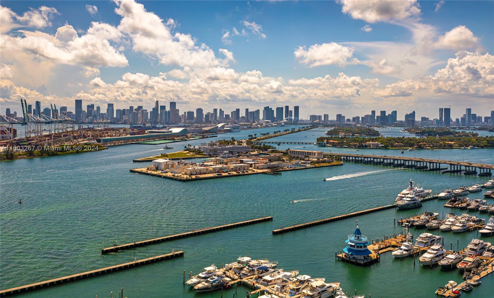 90 Alton Road, Unit 2806 Miami Beach, FL 33139 - Photo 35 of 36 an aerial view of a house with a lake view
