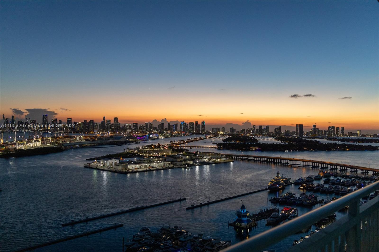 90 Alton Road, Unit 2806 Miami Beach, FL 33139 - Photo 36 of 36 a view of a lake from a city