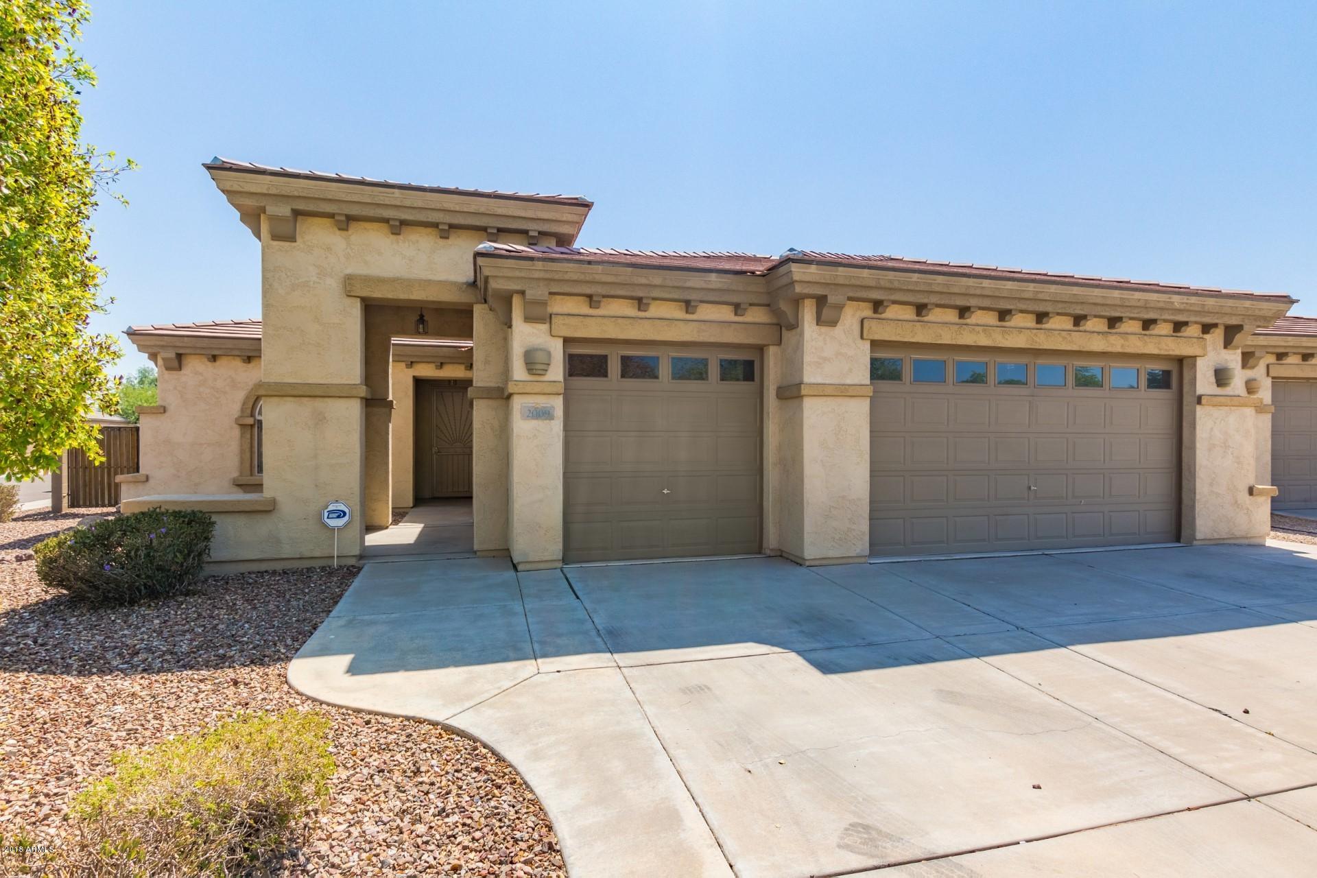 2009 North Rascon Loop Phoenix, AZ 85037 - Photo 1 of 25 0002-Rascon (1)