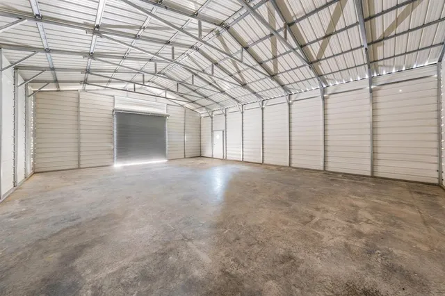 a view of a room with an empty space