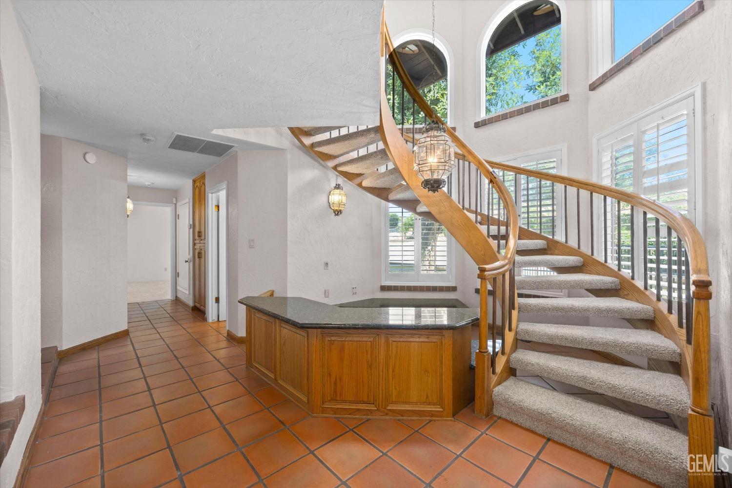 Undisclosed Address Bakersfield, CA 93306 - Photo 12 of 75 a view of entryway and hall with wooden floor