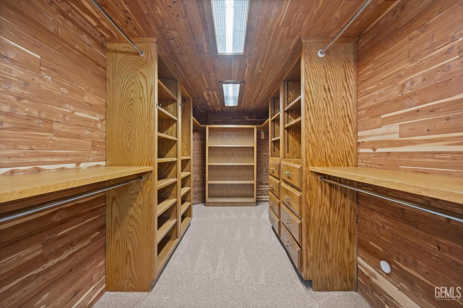 Undisclosed Address Bakersfield, CA 93306 - Photo 33 of 75 a view of an empty walk in closet