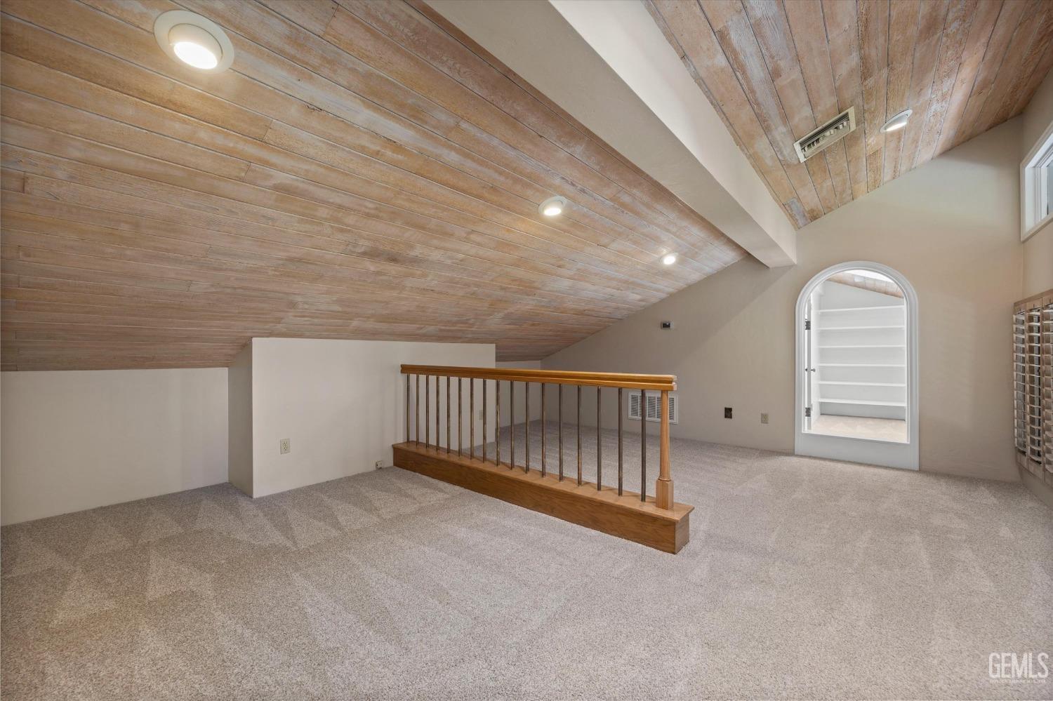 Undisclosed Address Bakersfield, CA 93306 - Photo 51 of 75 a view of a livingroom with a staircase