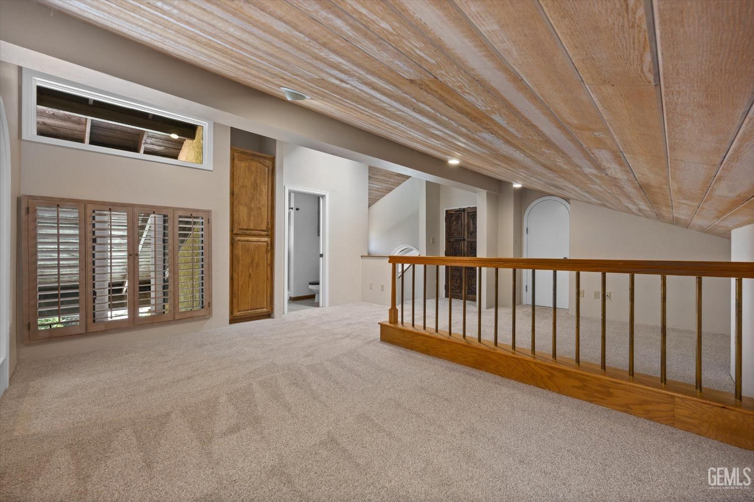 Undisclosed Address Bakersfield, CA 93306 - Photo 52 of 75 a view of an empty room with stairs