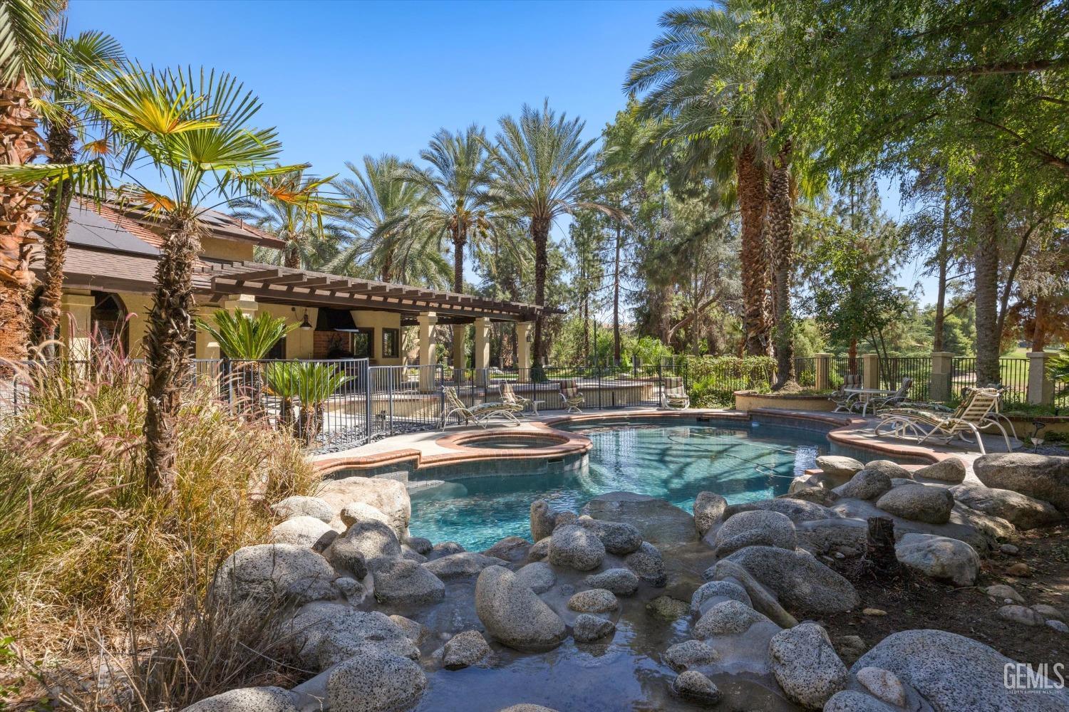 Undisclosed Address Bakersfield, CA 93306 - Photo 62 of 75 a view of swimming pool with sitting area and fire pit