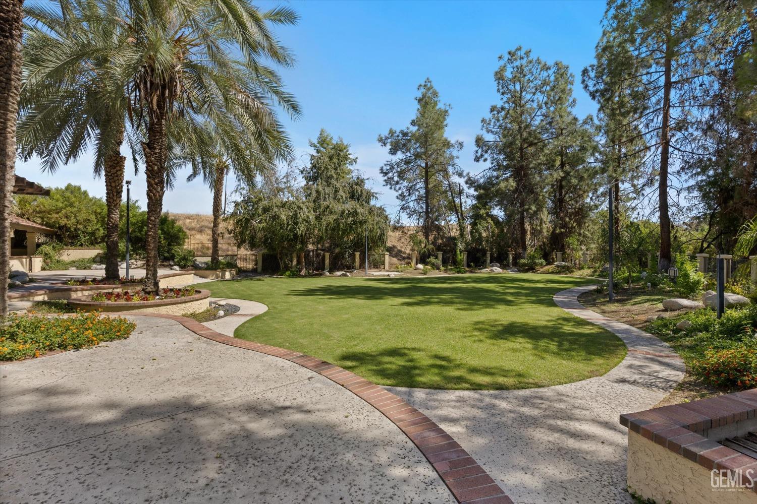 Undisclosed Address Bakersfield, CA 93306 - Photo 64 of 75 a view of a swimming pool with a patio