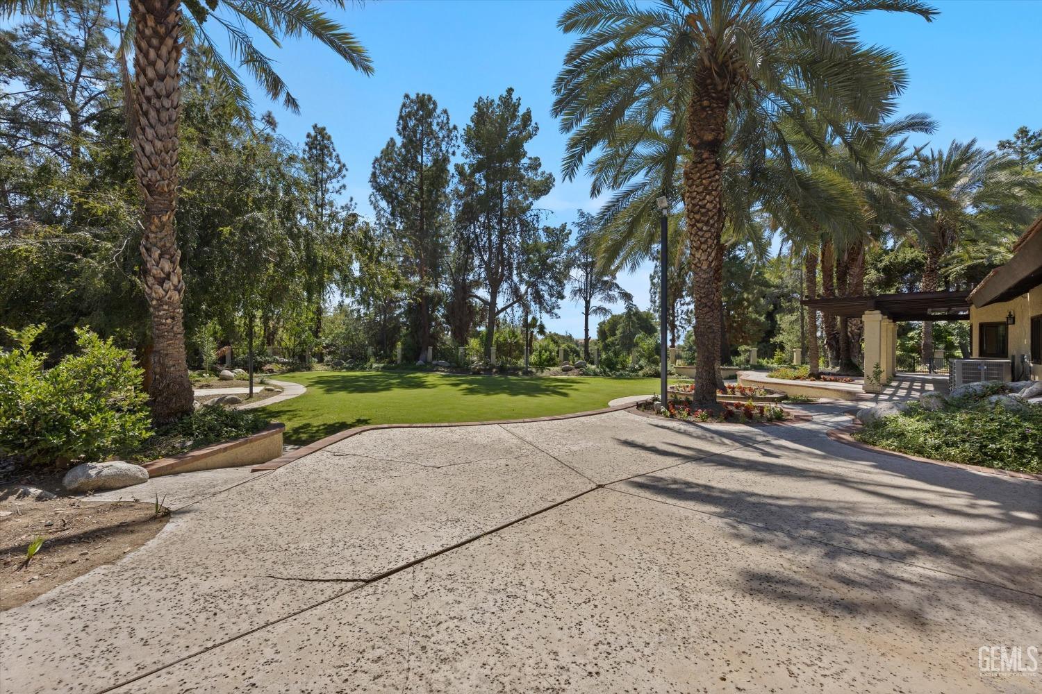 Undisclosed Address Bakersfield, CA 93306 - Photo 65 of 75 a view of a park with palm trees