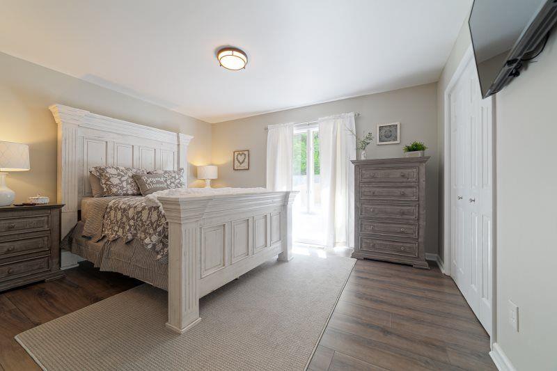 39 Schwarzwald Strasse Helen, GA 30545 - Photo 12 of 25 a bedroom with a bed and a window