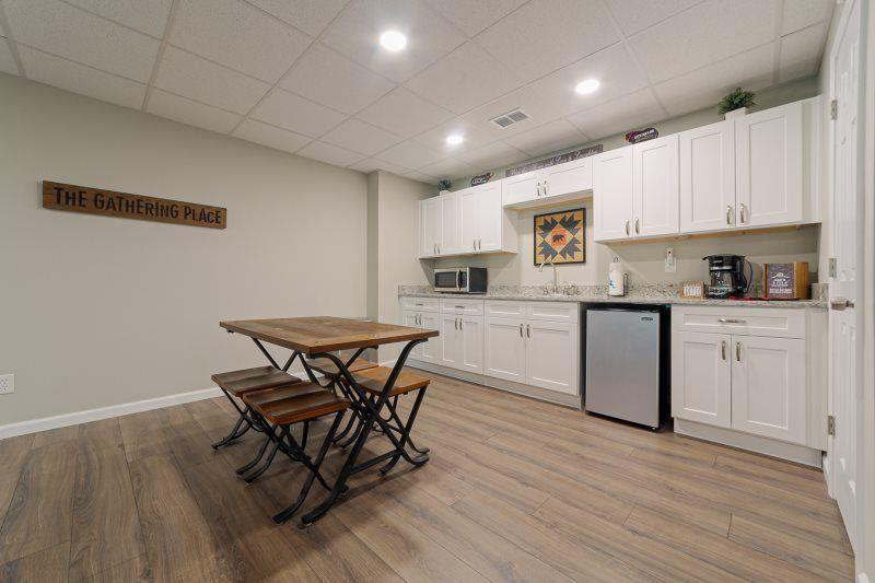 39 Schwarzwald Strasse Helen, GA 30545 - Photo 18 of 25 a open kitchen with a sink cabinets and wooden floor