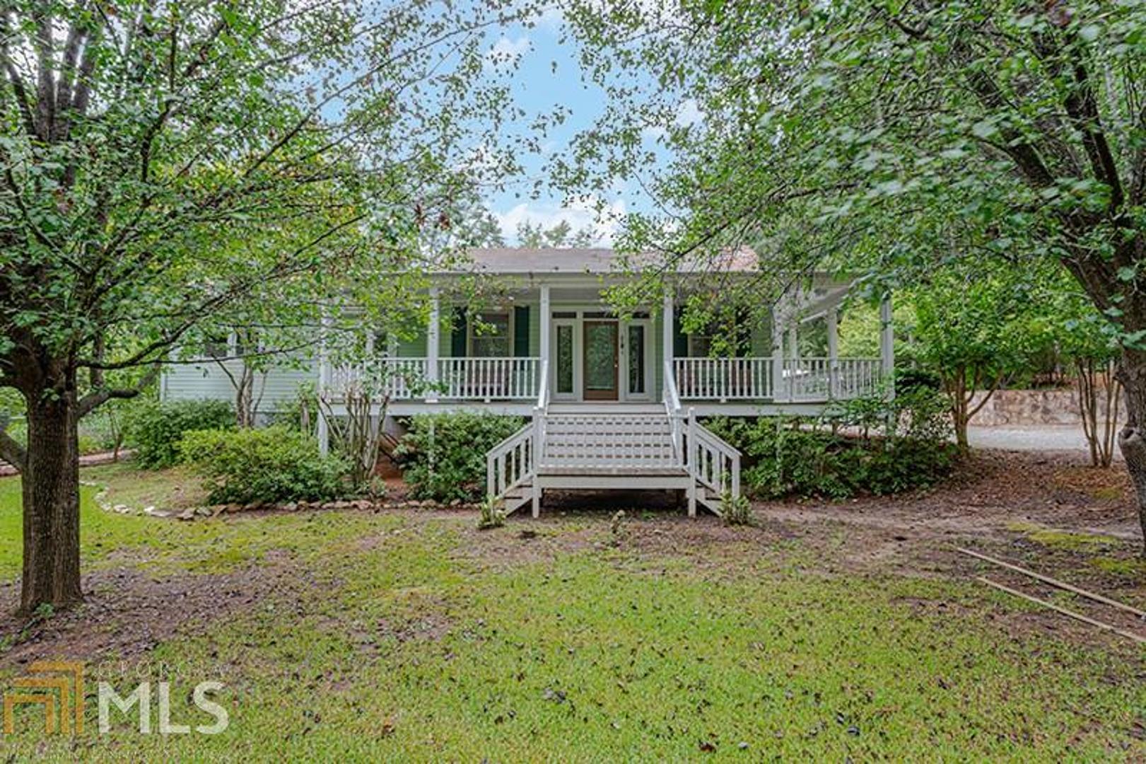 855 Ebenezer Road Fayetteville, GA 30215 - Photo 1 of 1 a view of a backyard with sitting area