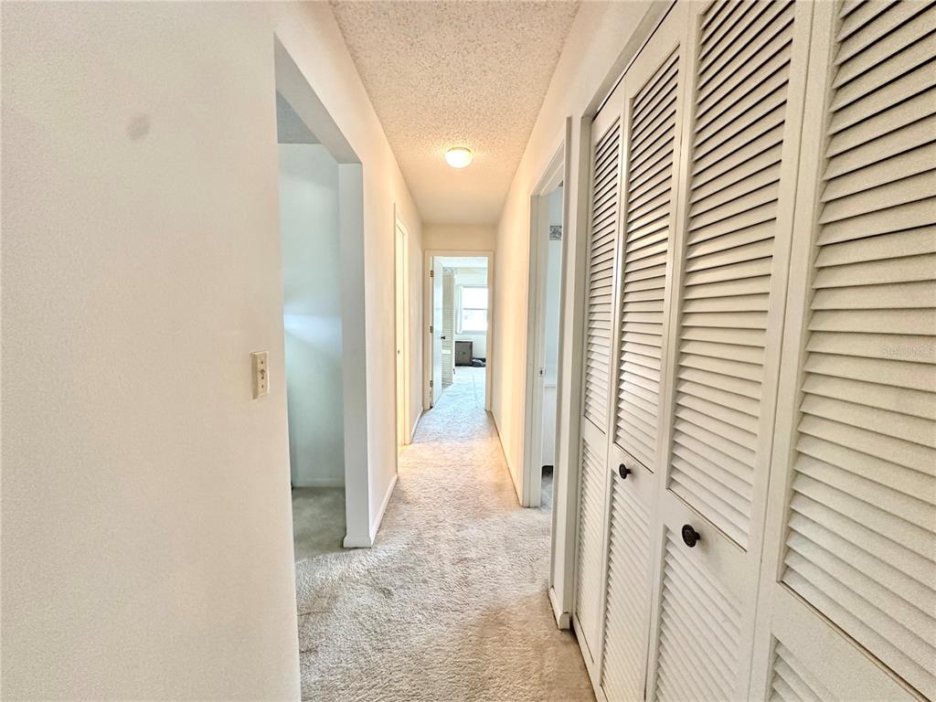 7414 Acorn Circle Spring Hill, FL 34606 - Photo 21 of 50 a view of a hallway with a white door