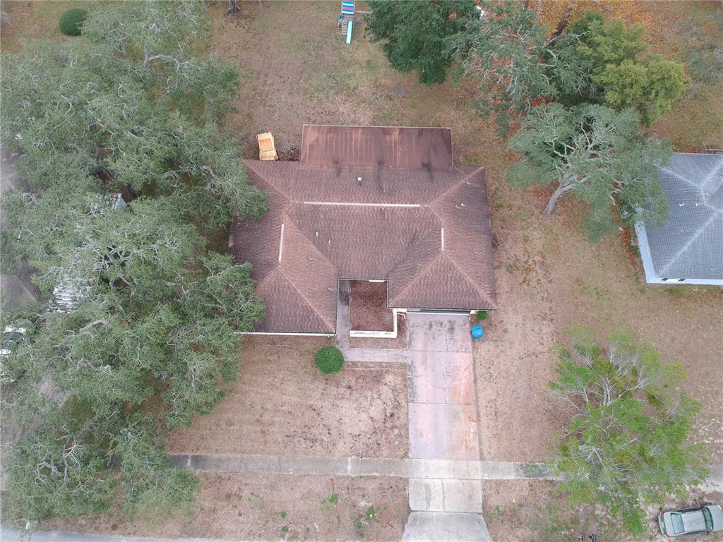 7414 Acorn Circle Spring Hill, FL 34606 - Photo 45 of 50 an aerial view of a house with a yard