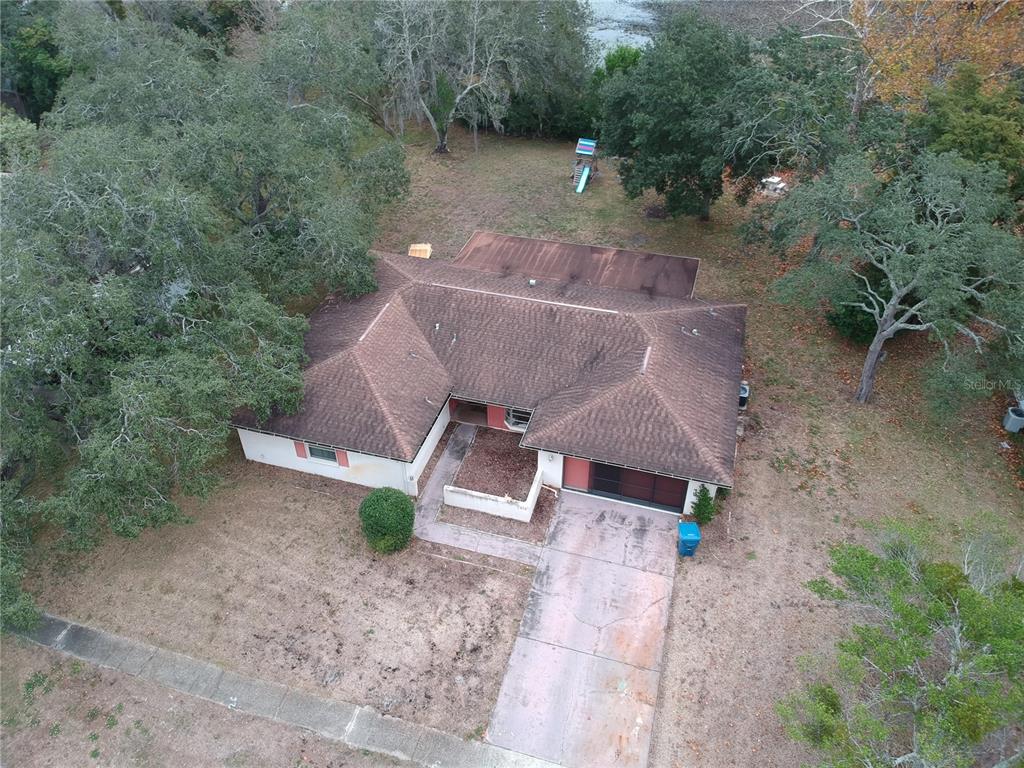 7414 Acorn Circle Spring Hill, FL 34606 - Photo 5 of 50 an aerial view of a house with outdoor space