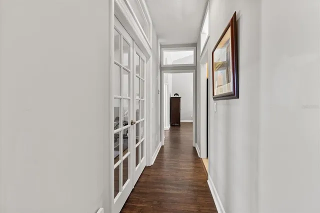 a work room with furniture and windows