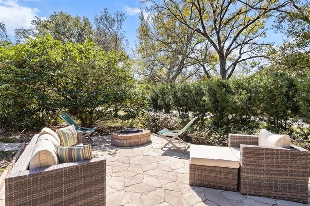a view of a two chairs in the balcony