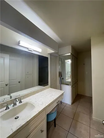 a bathroom with a toilet and a sink