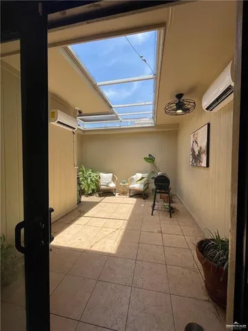 a kitchen with stainless steel appliances a sink and cabinets