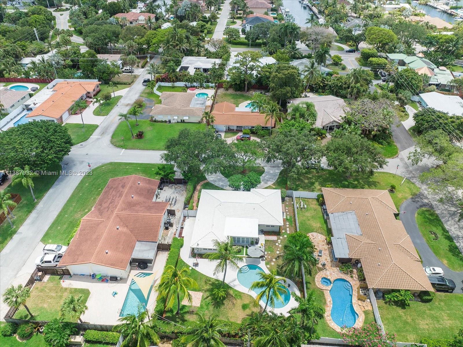 2533 Northeast 21st Terrace Lighthouse Point, FL 33064 - Photo 43 of 45 an aerial view of residential houses with outdoor space and street view