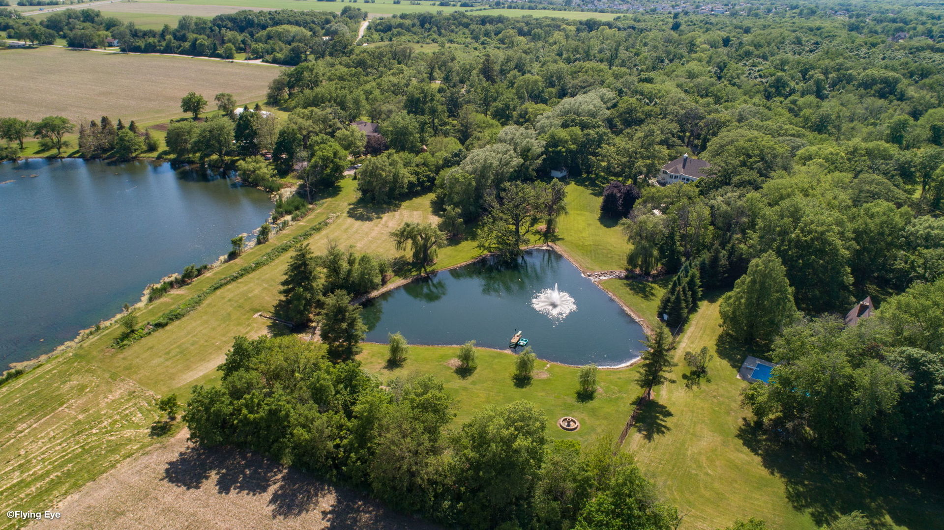 25565 South Tehle Road Elwood, IL 60421 - Photo 6 of 68 an aerial view of residential houses with outdoor space and lake view