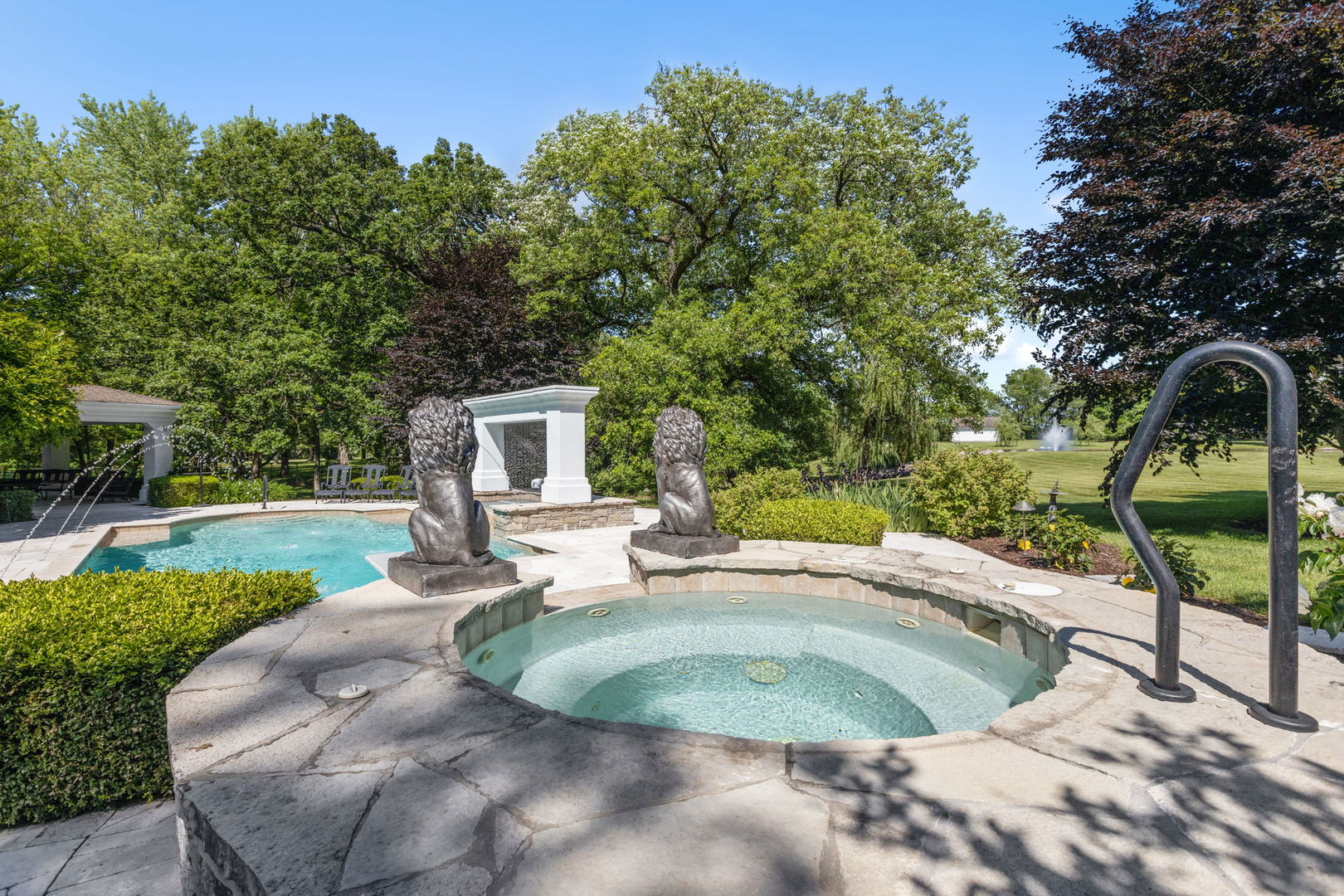 25565 South Tehle Road Elwood, IL 60421 - Photo 53 of 68 a house view with a swimming pool and garden