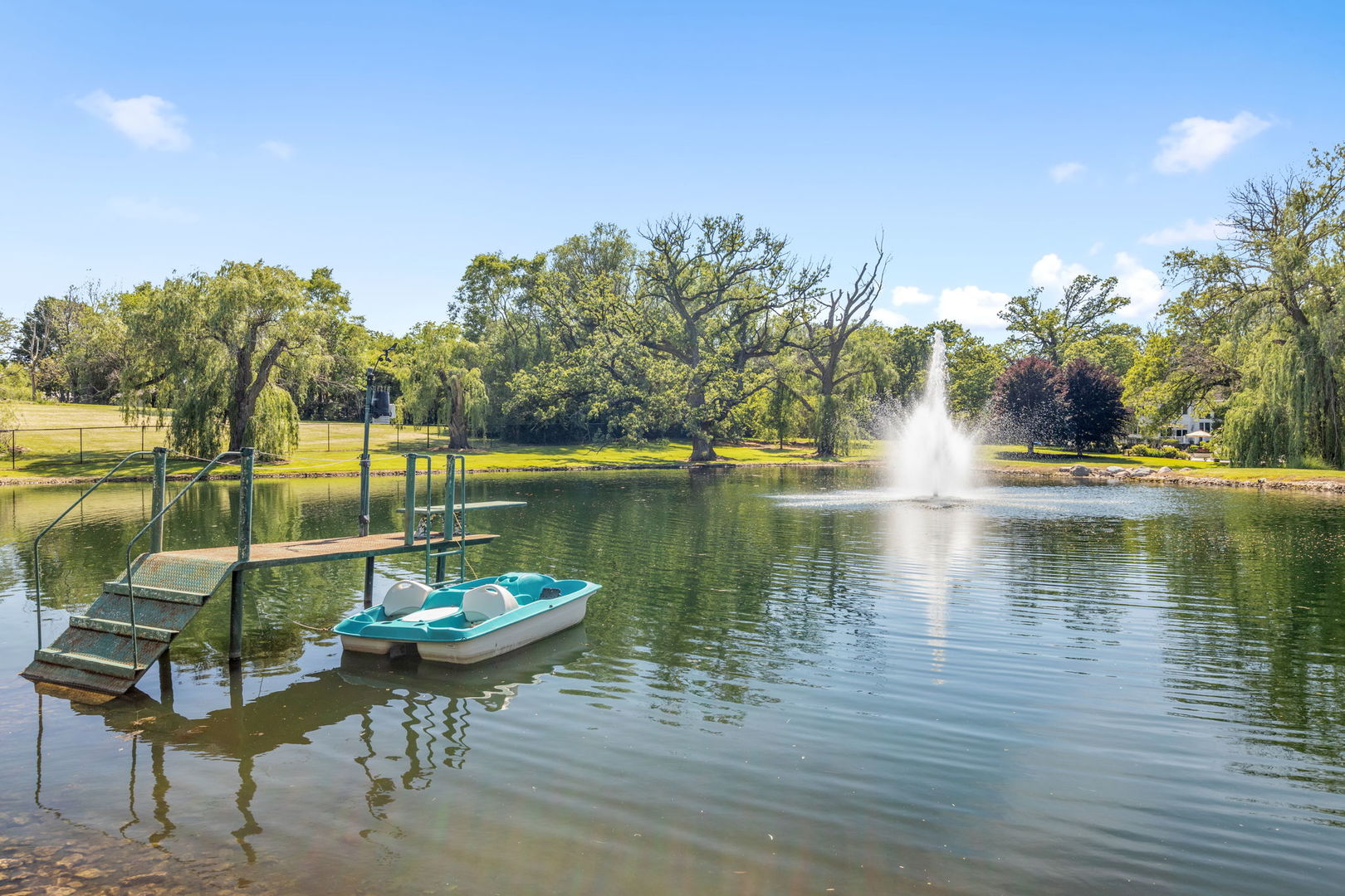 25565 South Tehle Road Elwood, IL 60421 - Photo 56 of 68 a view of a lake with a table and chairs