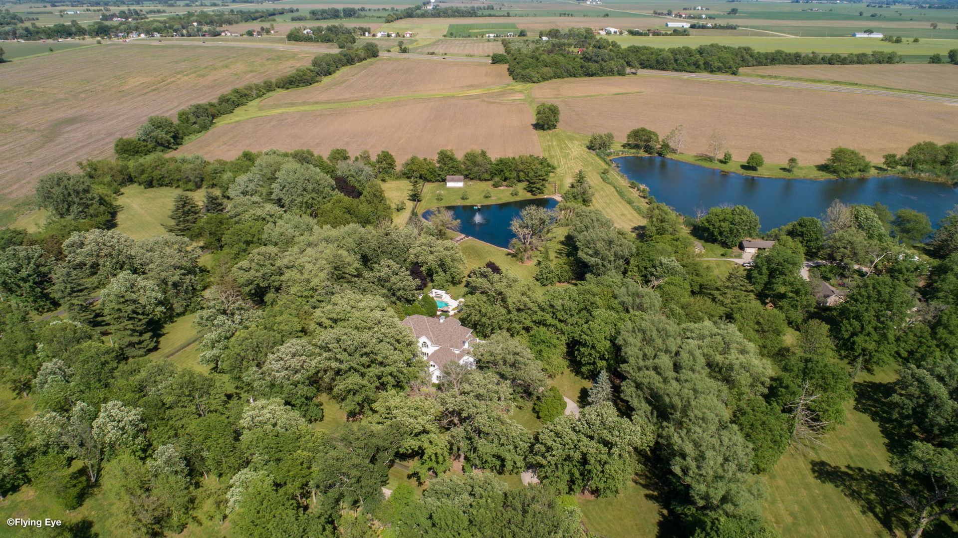 25565 South Tehle Road Elwood, IL 60421 - Photo 68 of 68 an aerial view of a houses with outdoor space and lake view