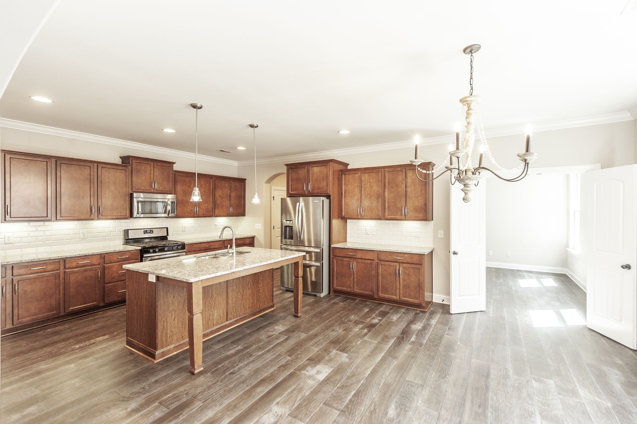 152 Ashcrest Point Hendersonville, TN 37075 - Photo 16 of 63 a kitchen with a stove a sink and a refrigerator