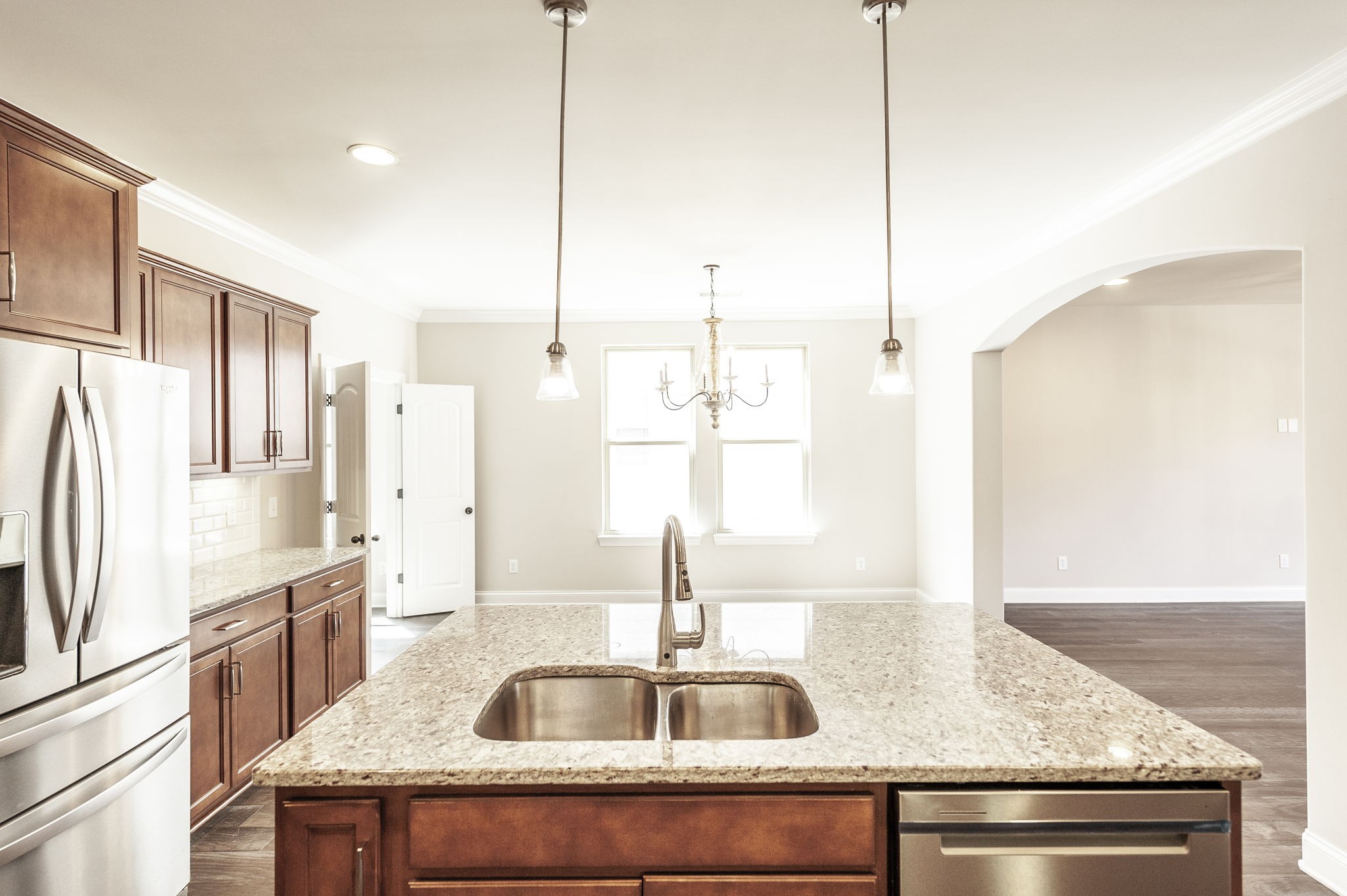 152 Ashcrest Point Hendersonville, TN 37075 - Photo 17 of 63 a kitchen with kitchen island a sink appliances and a counter top space