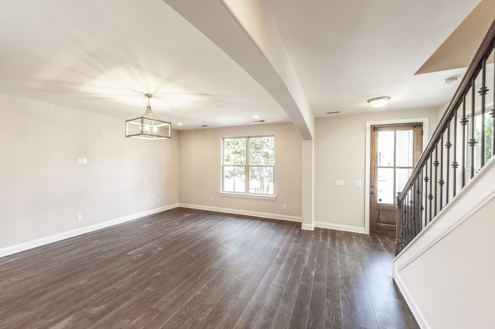 152 Ashcrest Point Hendersonville, TN 37075 - Photo 8 of 63 an empty room with wooden floor and windows