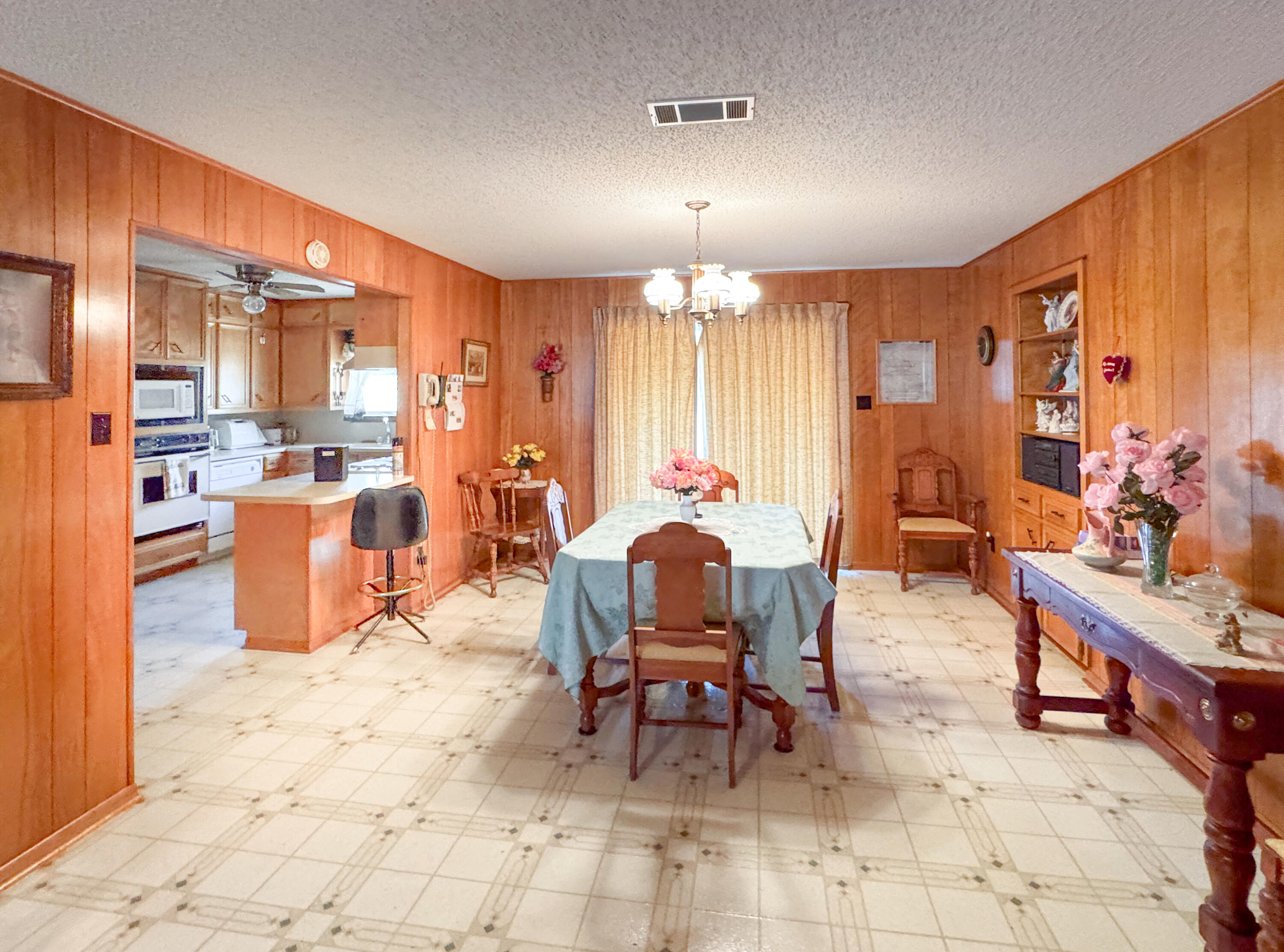 2775 Rust Spring Branch, TX 78070 - Photo 6 of 41 a living room with furniture a dining table and chairs
