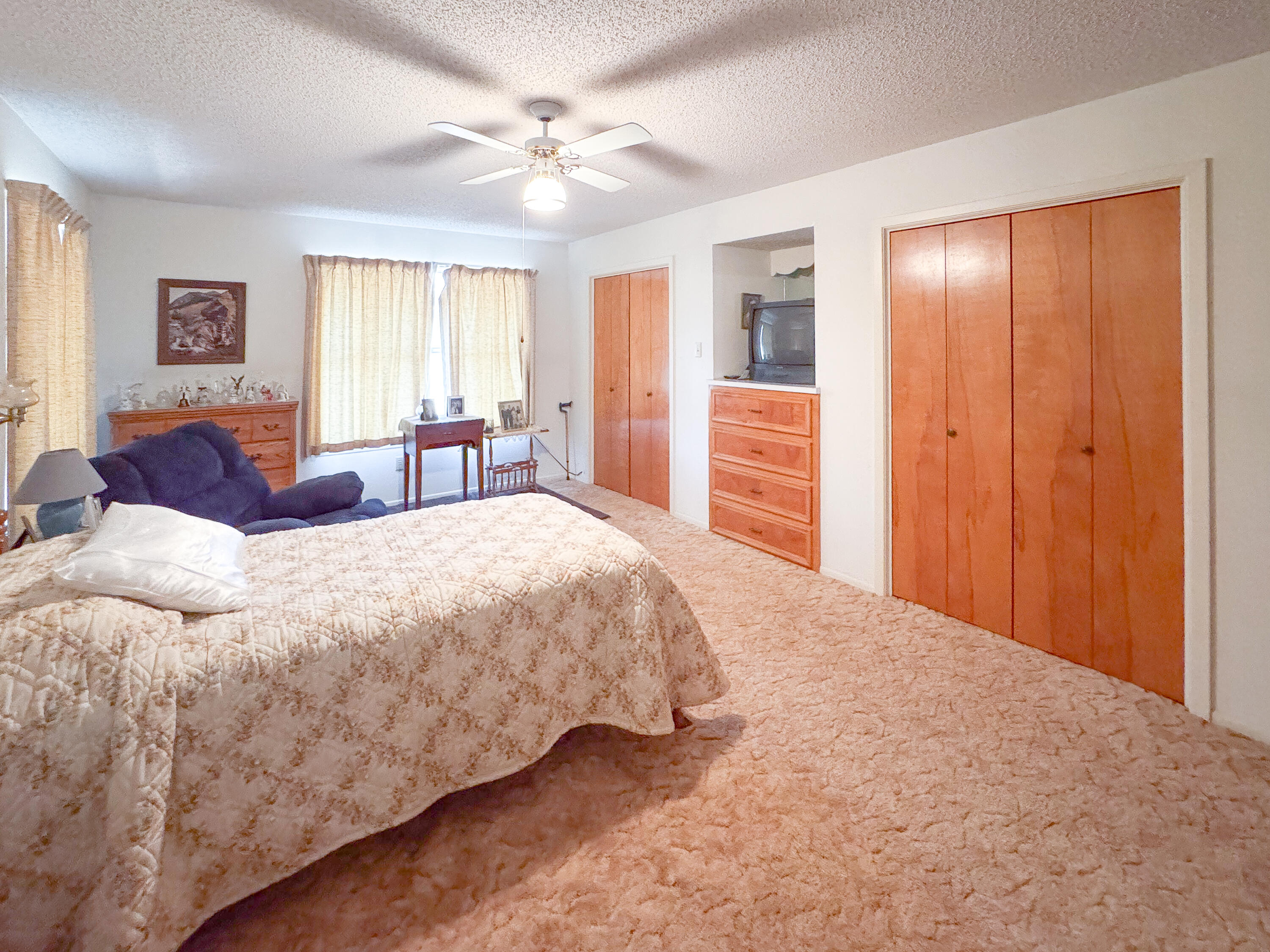 2775 Rust Spring Branch, TX 78070 - Photo 7 of 41 a spacious bedroom with a large bed and a window
