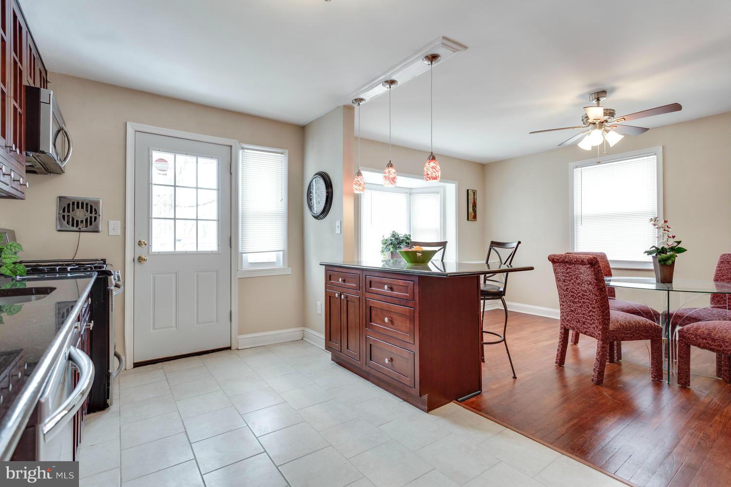 1701 Burnwood Road Baltimore, MD 21239 - Photo 12 of 30 a view of kitchen with furniture and window