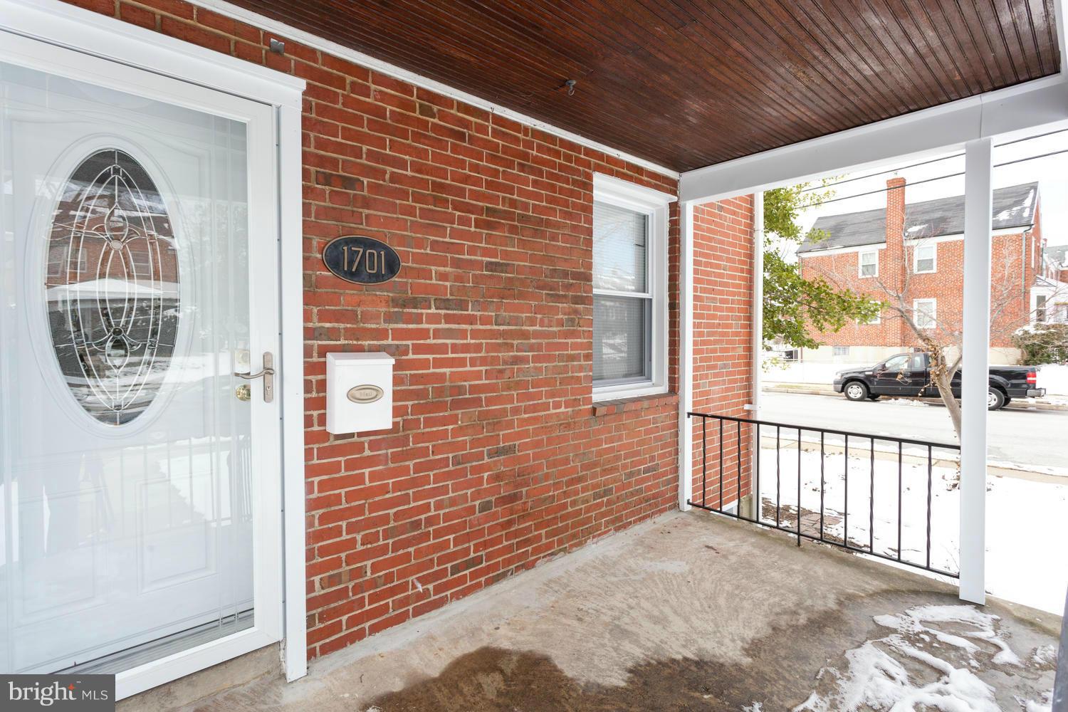 1701 Burnwood Road Baltimore, MD 21239 - Photo 3 of 30 a view of front door of house