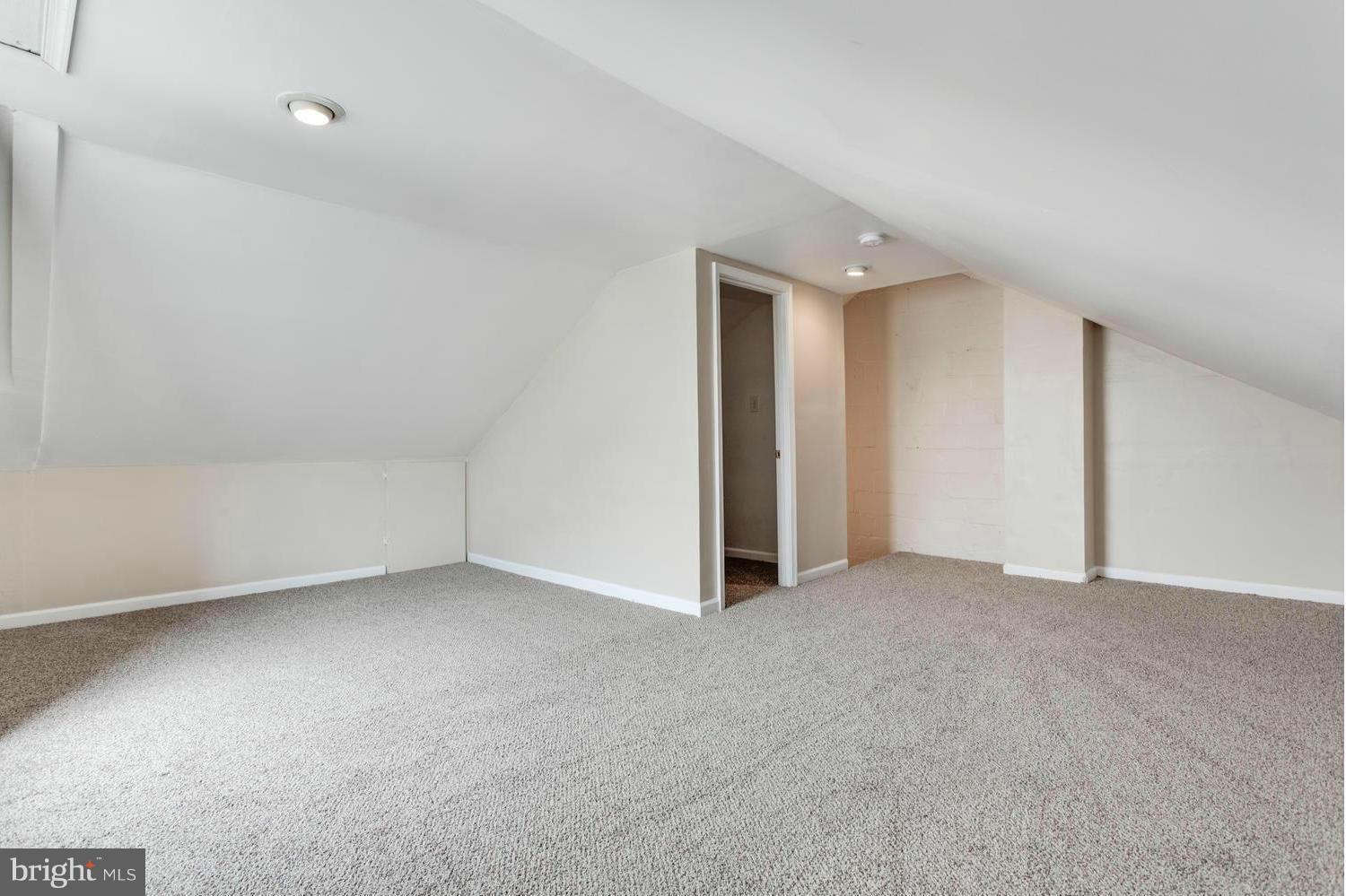 1701 Burnwood Road Baltimore, MD 21239 - Photo 20 of 30 a view of an empty room with a window