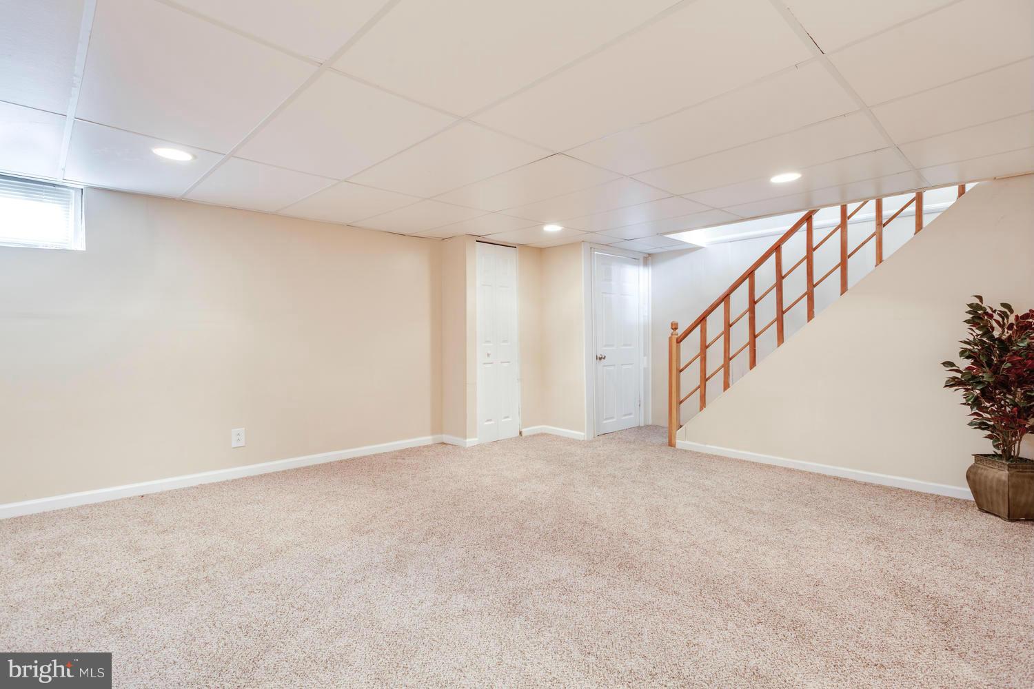 1701 Burnwood Road Baltimore, MD 21239 - Photo 23 of 30 a view of an empty room with stairs