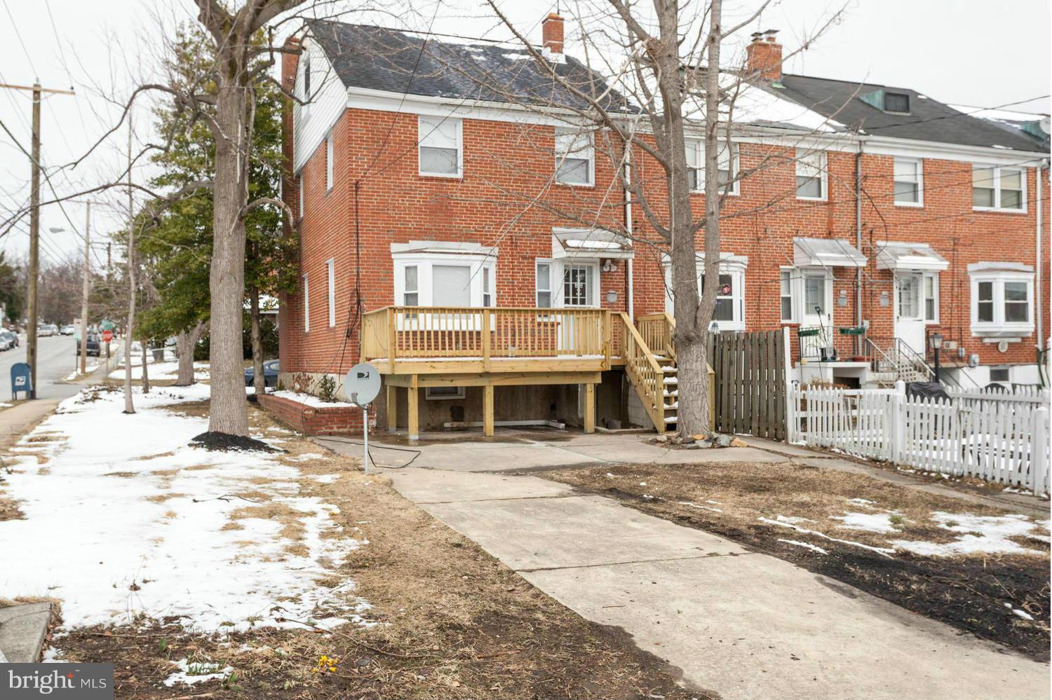 1701 Burnwood Road Baltimore, MD 21239 - Photo 26 of 30 a view of a building with a patio