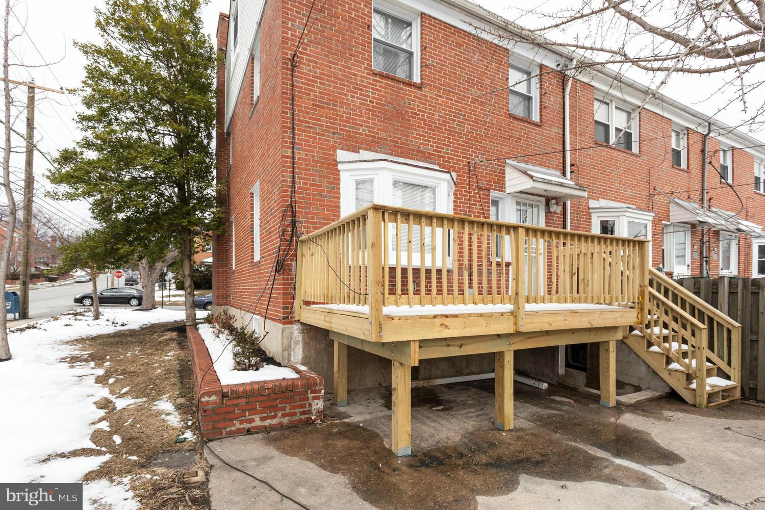 1701 Burnwood Road Baltimore, MD 21239 - Photo 27 of 30 a view of a building with a bench