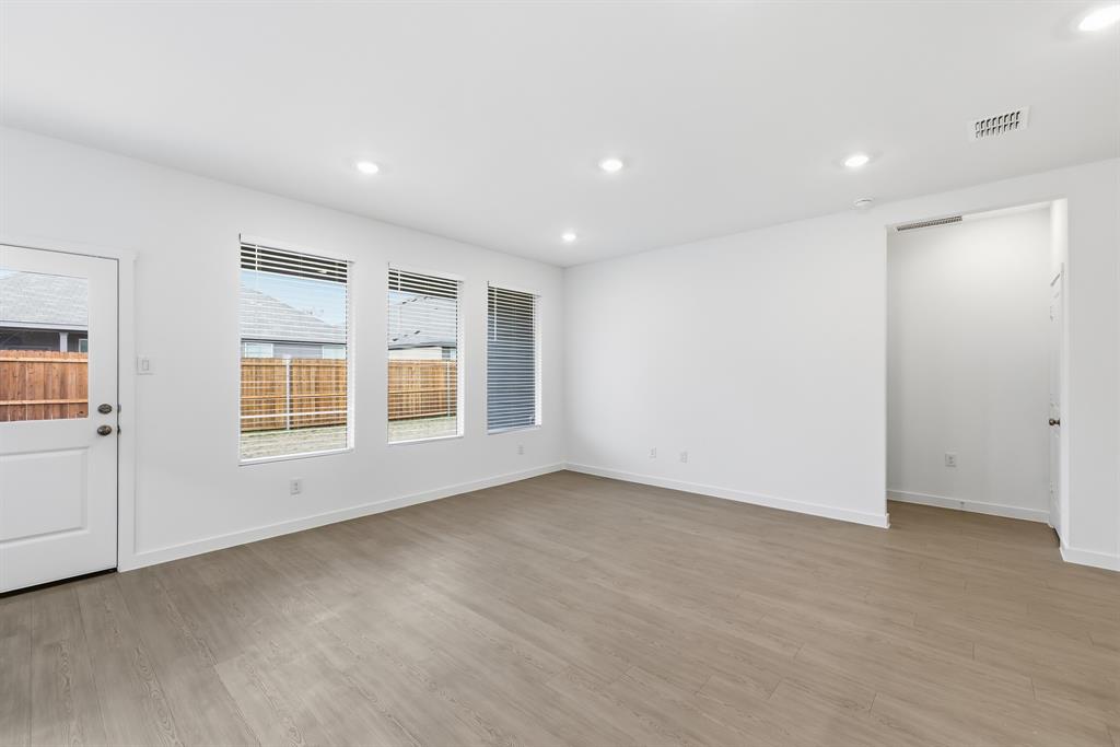 4916 Ascot Way Princeton, TX 75407 - Photo 16 of 39 a view of an empty room with a window