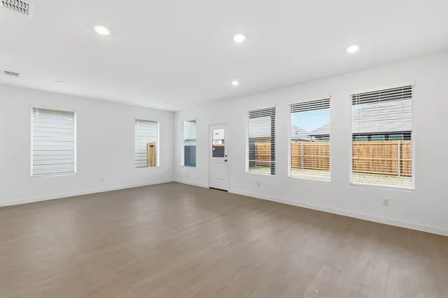 an empty room with windows