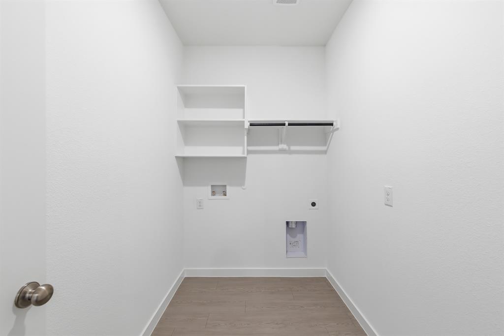 4916 Ascot Way Princeton, TX 75407 - Photo 29 of 39 a view of an empty walk in closet